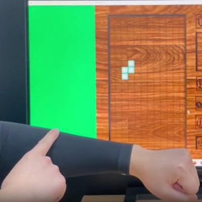 A Touch-responsive Fabric Armband – For Flexible Keyboards, Wearable Sketchpads