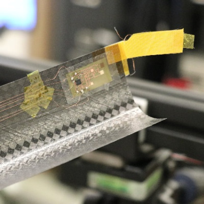 Flexible Electronics Integrated with Paper-thin Structure for Use in Space