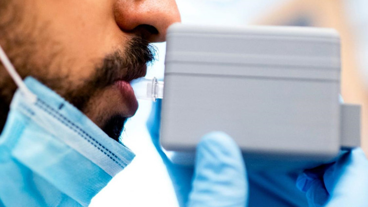 Quick COVID Breathalyzer Could Allow Mass Screening in Public Places