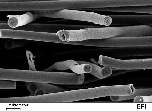 Scanning electron image of fibers in a novel electrospun nonwoven which exhibits an unusual combination of high electrical conductivity and extremely low thermal conductivity.