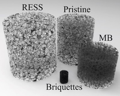 Illustrative representation of the bulk density difference between the four kinds of single-walled carbon nanotubes used, from the left: RESS (expanded), pristine, briquette (compressed), and commercial masterbatch (MB). The cylinders are of equal mass.
