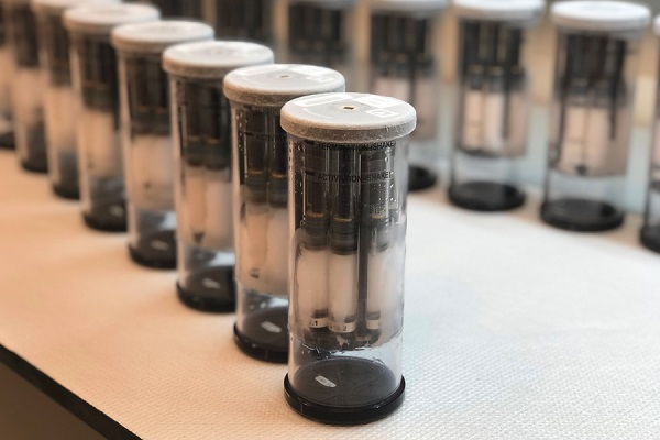 Caption:Inside these vials are chambers containing the new surface material and the microbes. They were launched in stasis to ISS to avoid bacterial growth before reaching microgravity conditions. Once in ISS, the astronauts activated the samples by combining the various chambers in the vials.