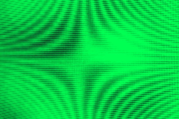 The moiré pattern: here, a green screen was photographed with a digital camera. Both the monitor and the semiconductor chip in the digital camera have a regular pixel grid