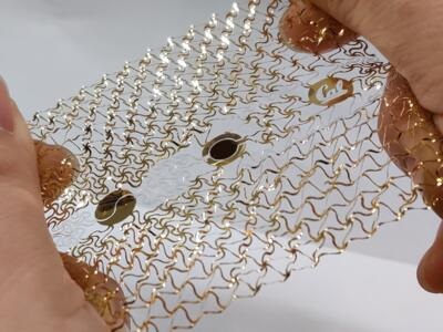A stretchable “smart mesh” made from the two-mode cutting fabrication process