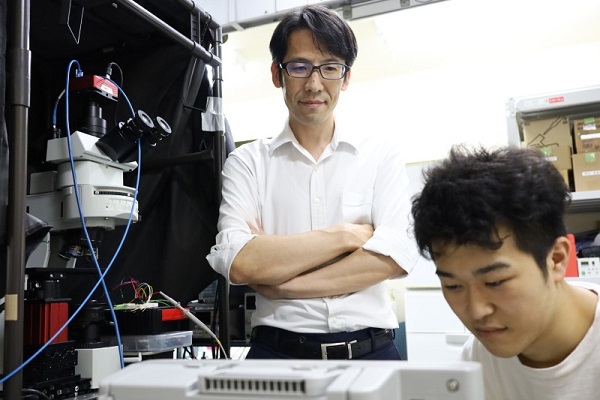 Kazuhiro Takahashi (top centre) and his team are developing a semiconductor sensor that could be use to detect diseases at home