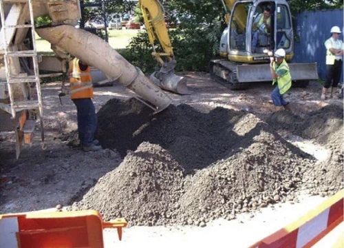 Semidry concrete for a road foundation